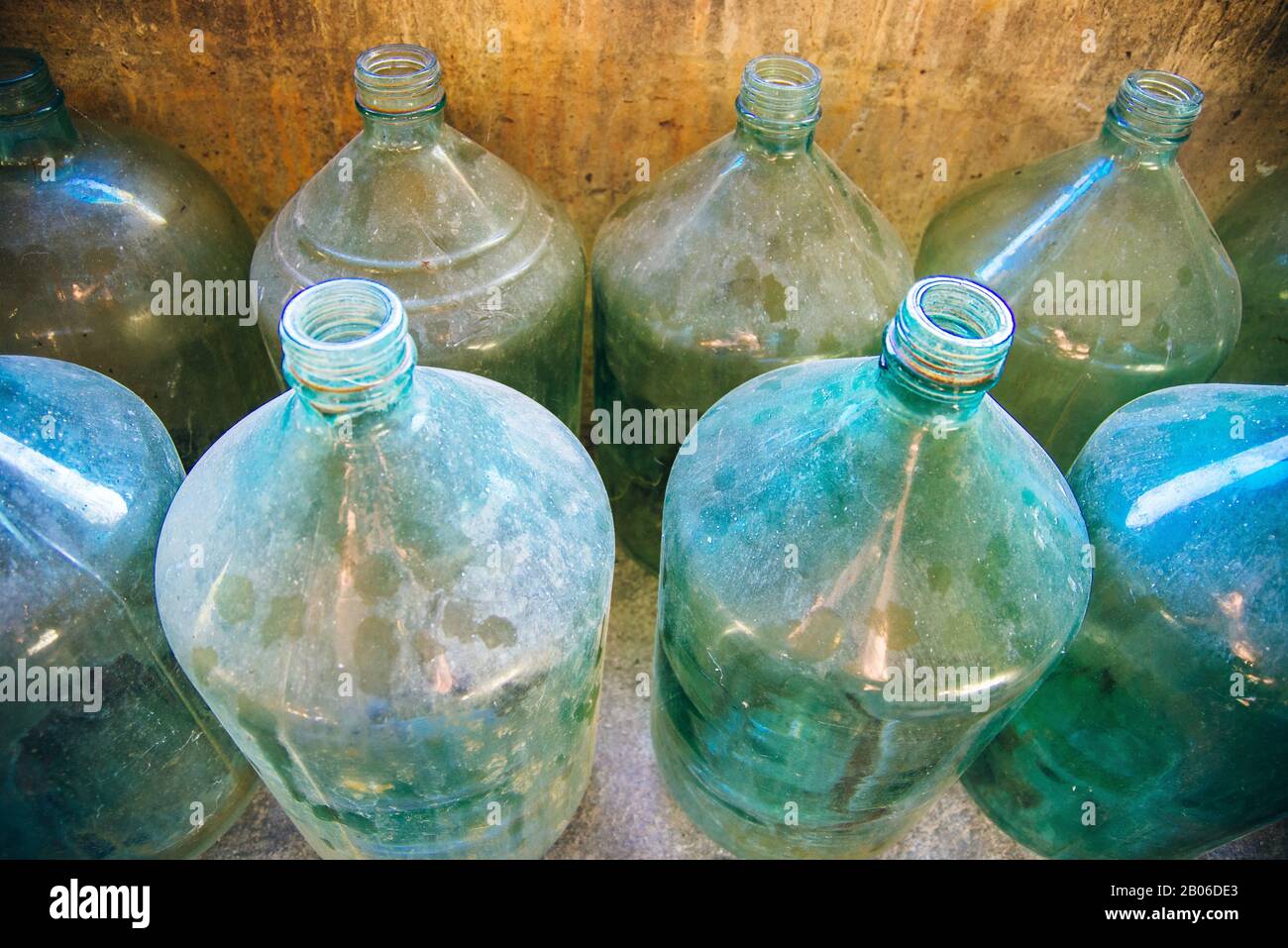 huge glass bottles for wine Stock Photo Alamy