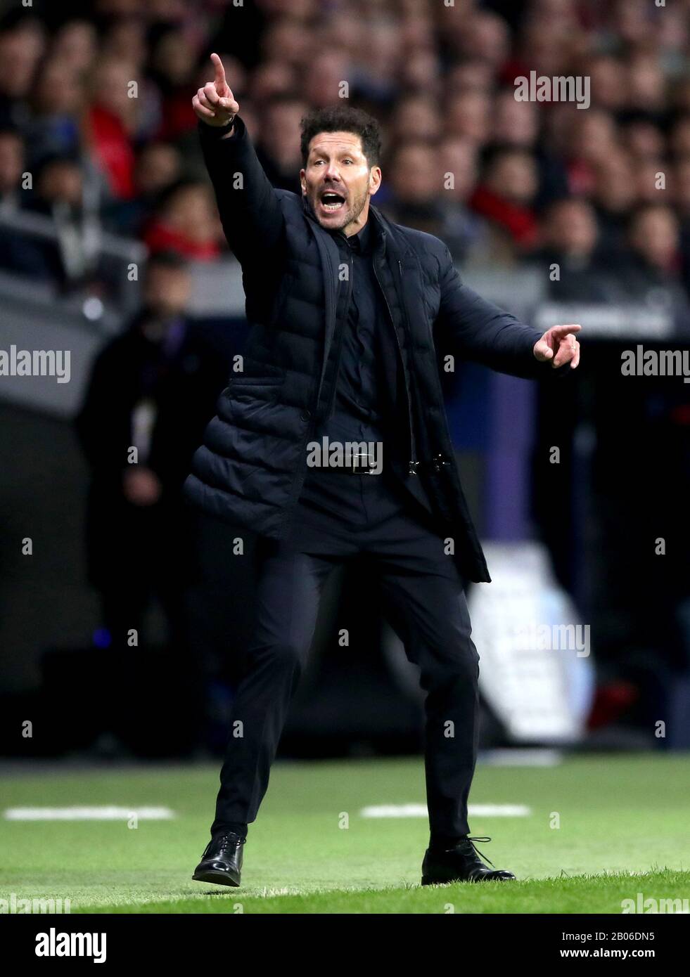 Atletico Madrid manager Diego Simeone gestures on the touchline during the UEFA Champions League round of 16 first leg match at Wanda Metropolitano, Madrid. Stock Photo