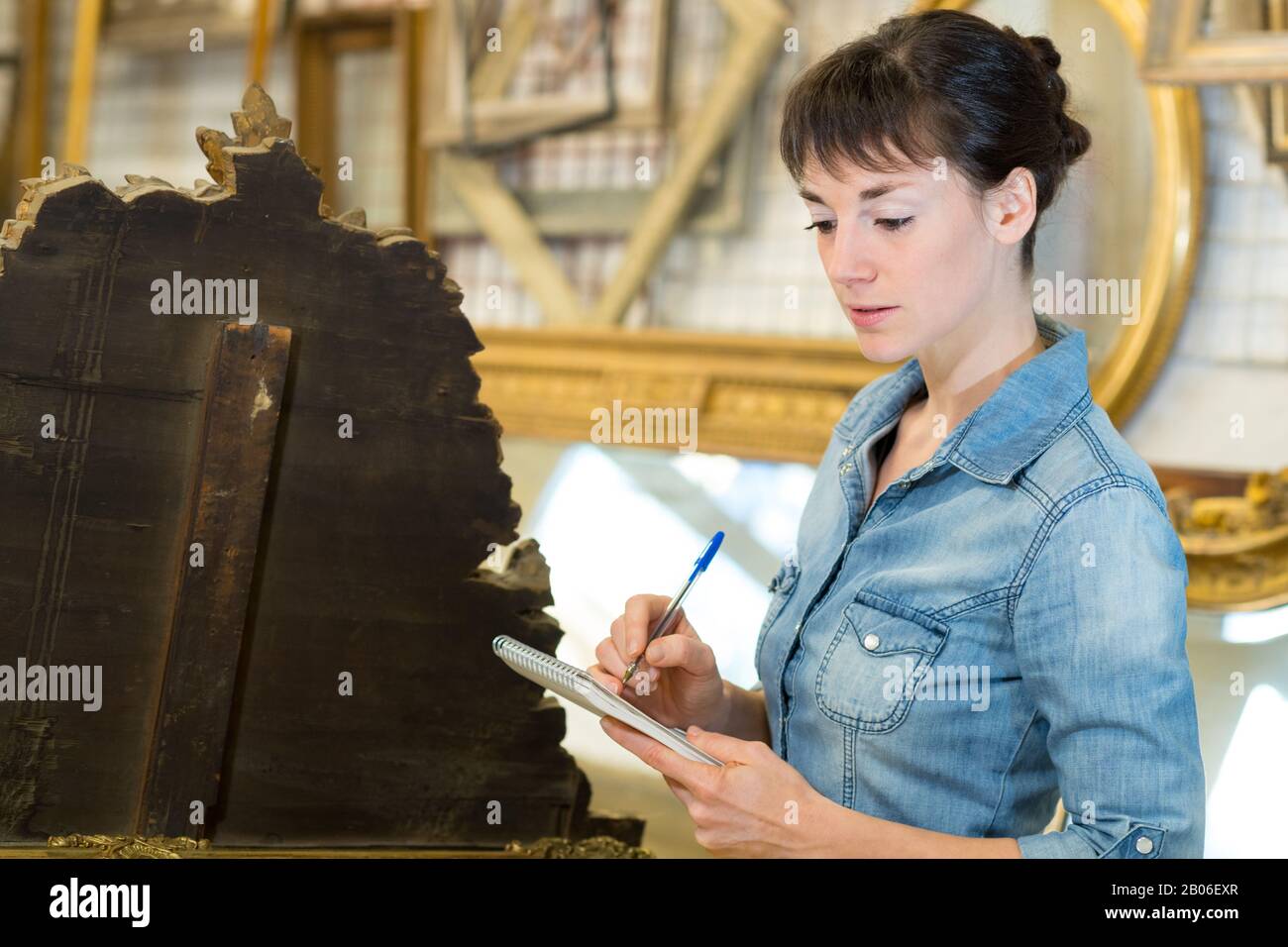 female wooden antique restoration worker Stock Photo Alamy