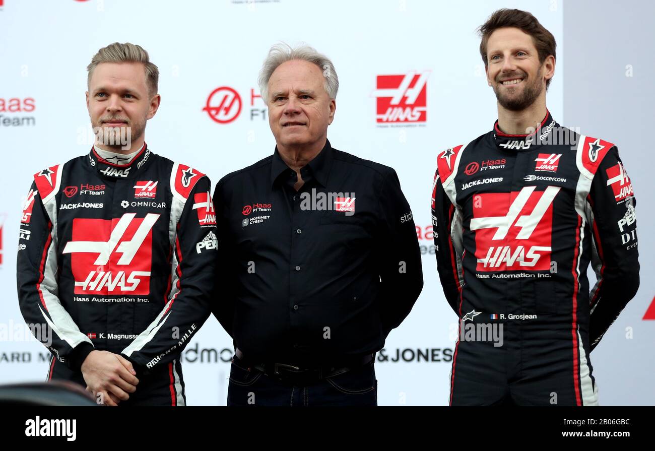 Haas Racing F1 drivers Kevin Magnussen (left), Romain Grosjean (right) with Gene Haas during day one of pre-season testing at the Circuit de Barcelona-Catalunya. Stock Photo
