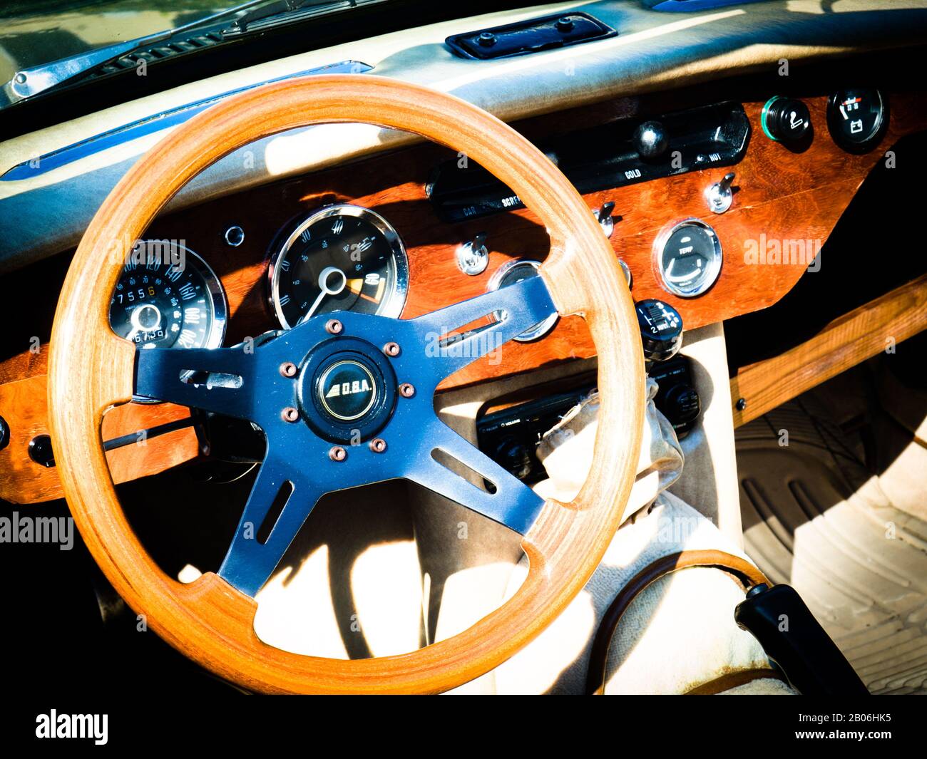 Close up of a Classic car,Triumph Spitfire wooden dashboard and steering wheel Stock Photo