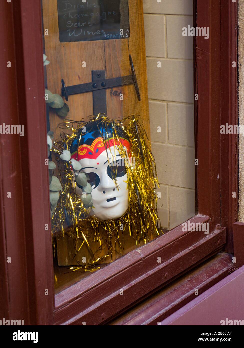 Venetian Carnival Mask in a shop window Stock Photo
