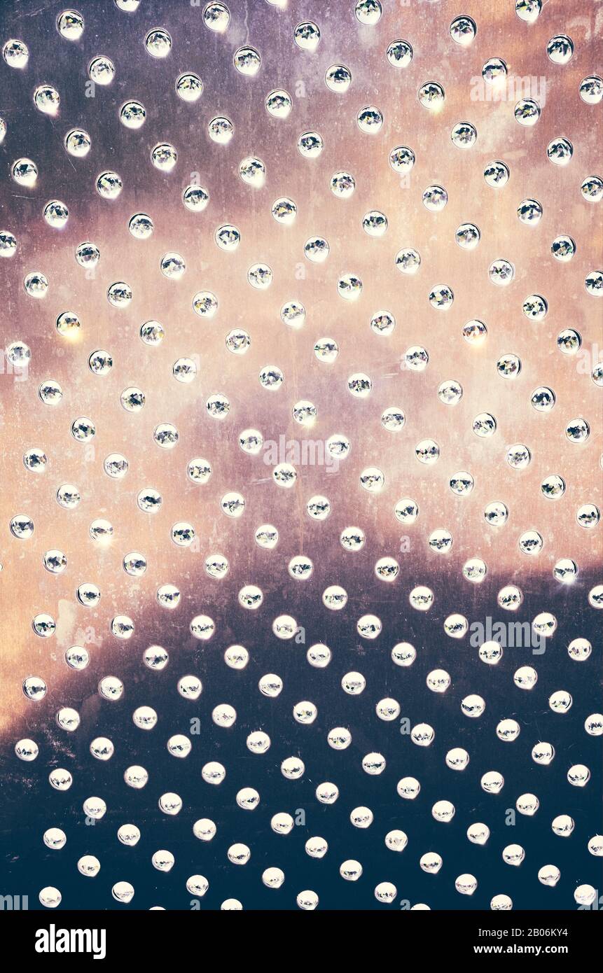 Abstract dark background with shining round dots. Stock Photo