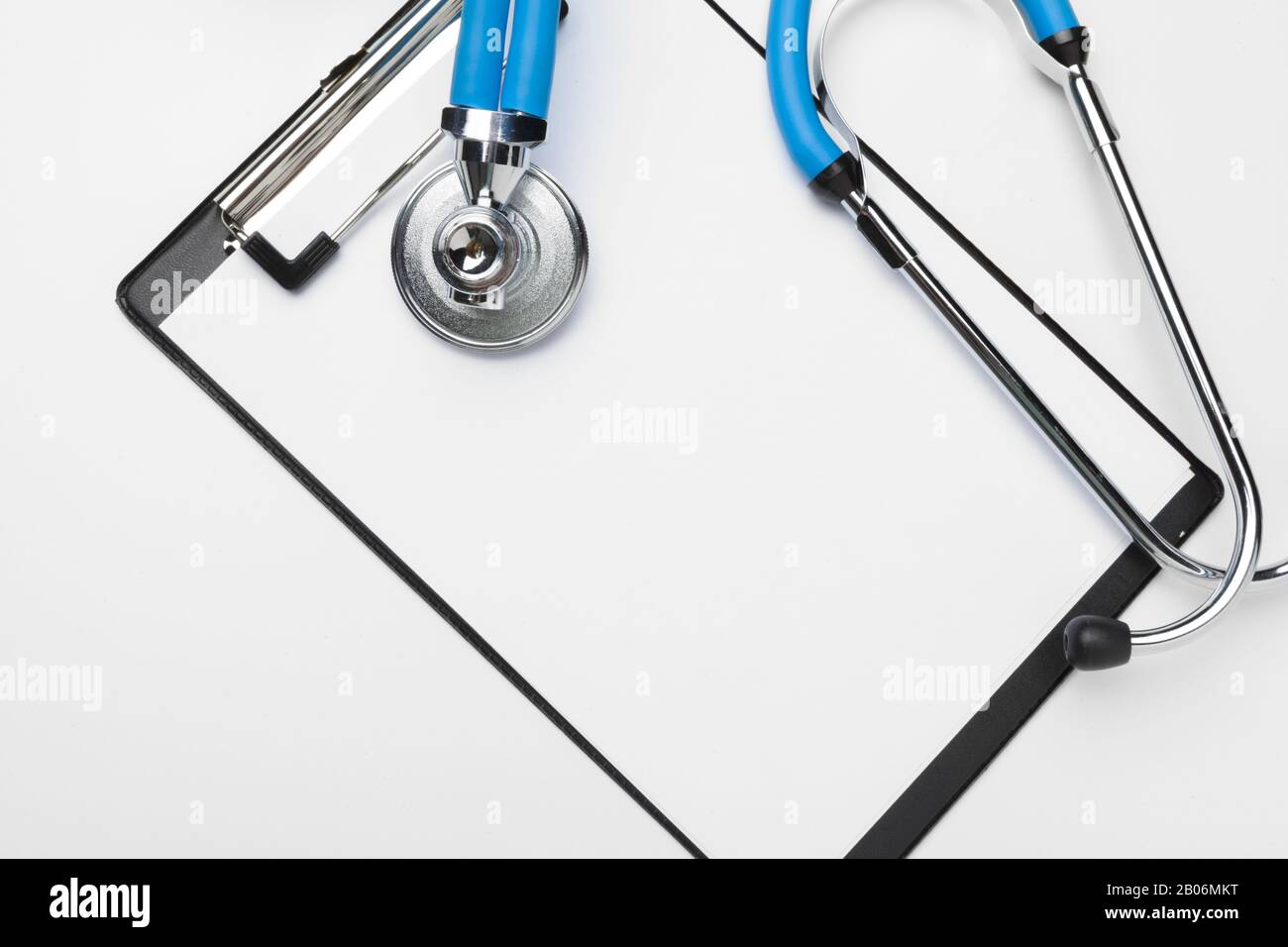 Blank medical clipboard with stethoscope on white background Stock ...