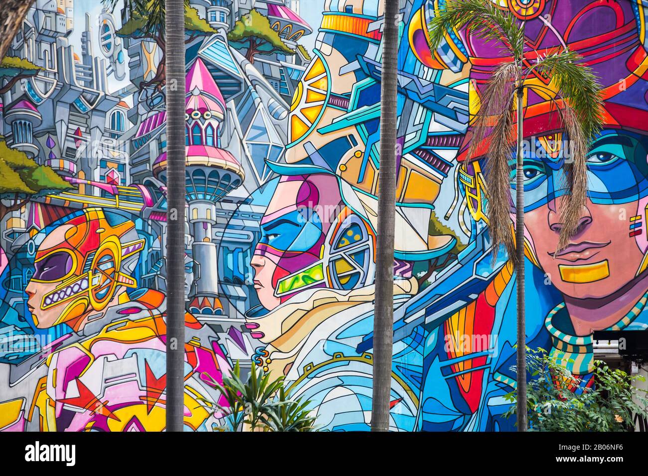 Beautiful wall mural paintings on a large wall behind Haji Lane