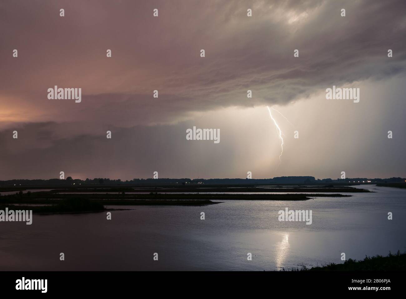 Powerful lightning stroke over a lake Stock Photo