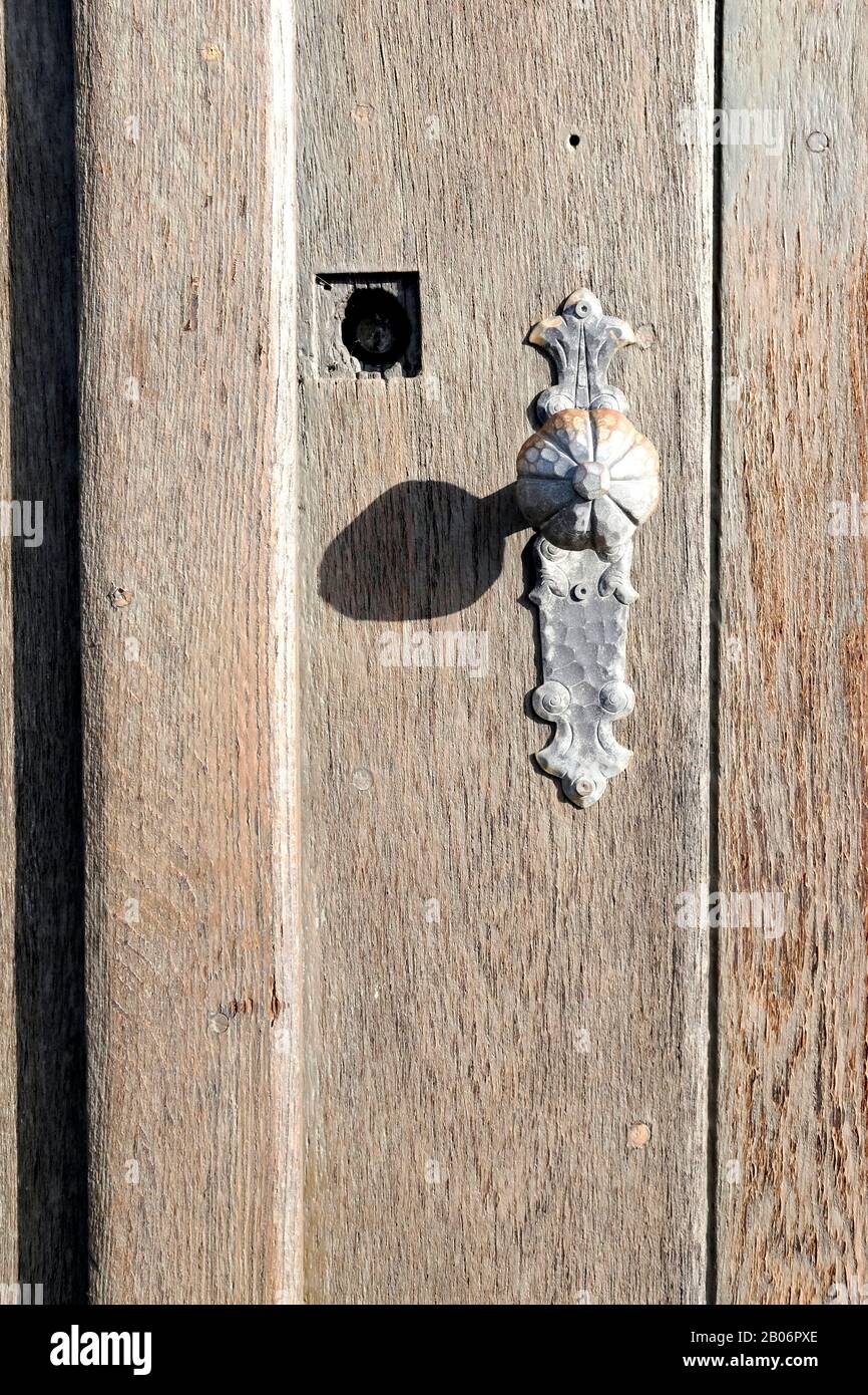 A close up view of a door and its handle, Strasbourg, France Stock Photo