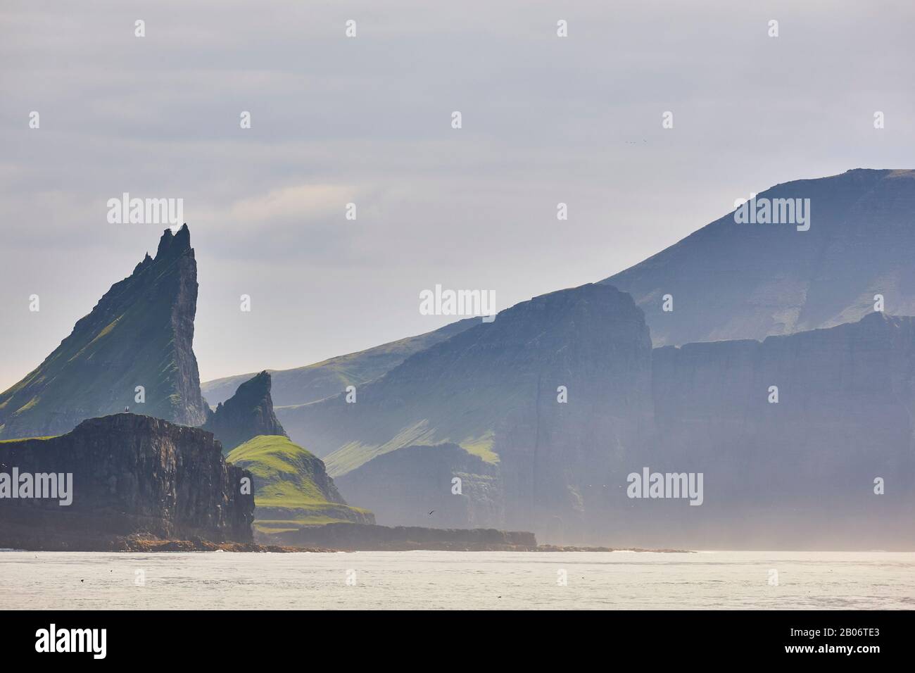 Faroe islands sunset dramatic coastline landscape in Vagar island ...