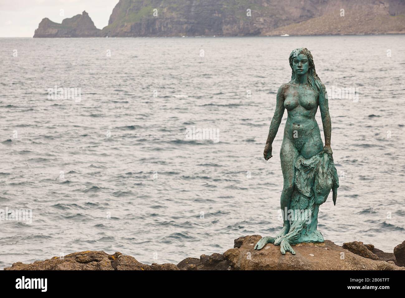 Faroe islands fjord coastline landscape in Kalsoy island. Mikladalur mermaid Stock Photo