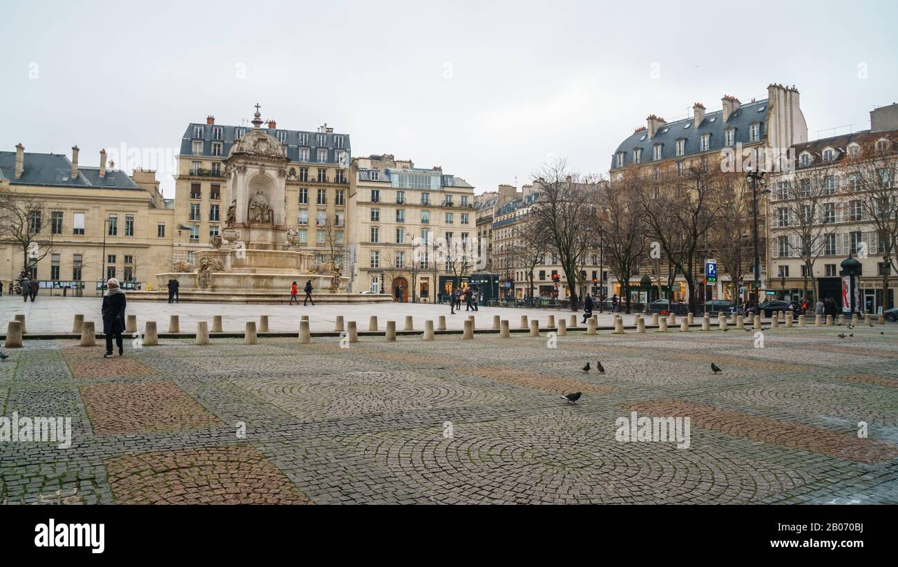 Paris, France January 20, 2019 Fountain in front of the church of Saint-Sulpice. Stock Photo
