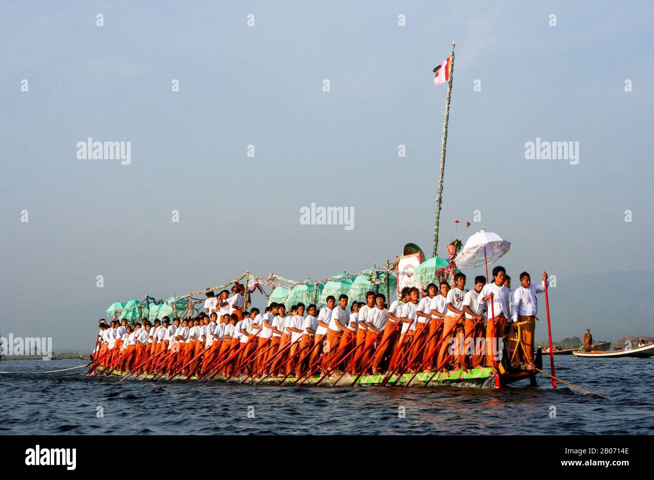 Traditional rowing boat in Burma (rowers push rowing with their feet) Inle Lake Stock Photo