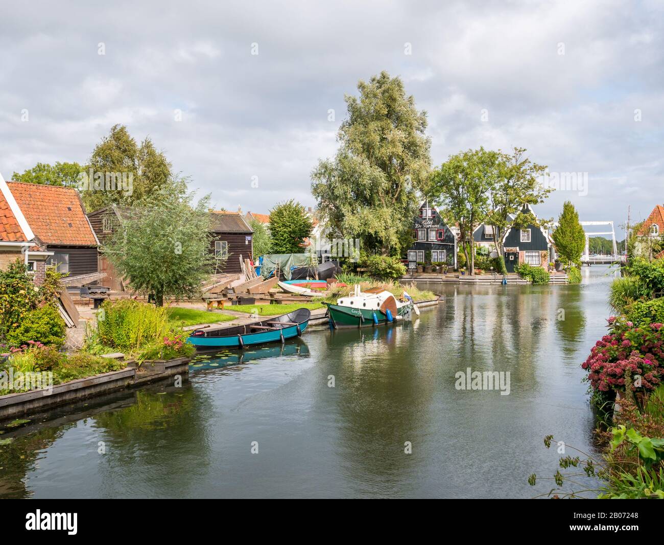 Old shipyard and houses along canal in Edam, Noord-Holland, Netherlands Stock Photo