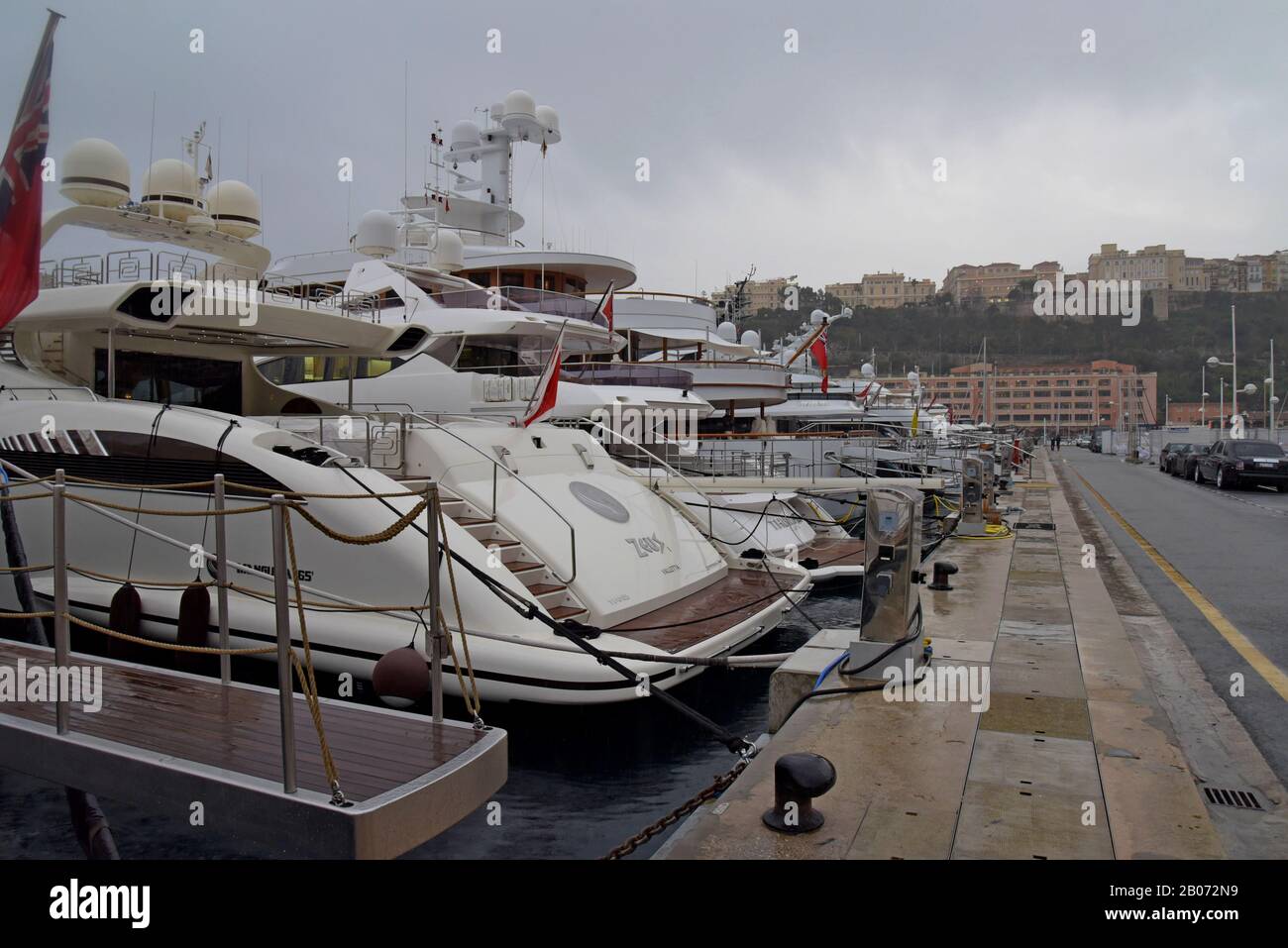 Ssuper yachts moored in the harbour at Monte Carlo, Monaco. 17th January 2020 Foreground yacht