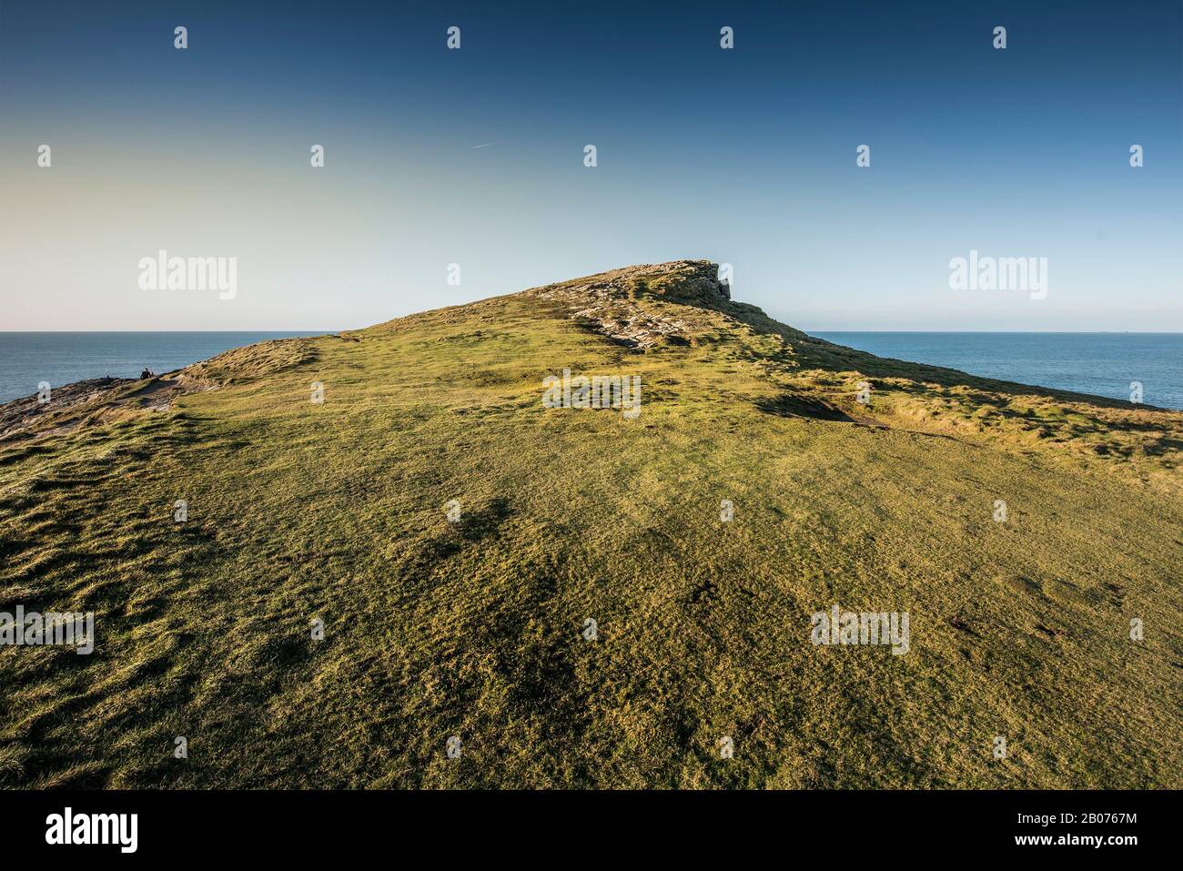 The rugged summit of Trevelgue Head Porth Island on the coast of Newquay in Cornwall. Stock Photo