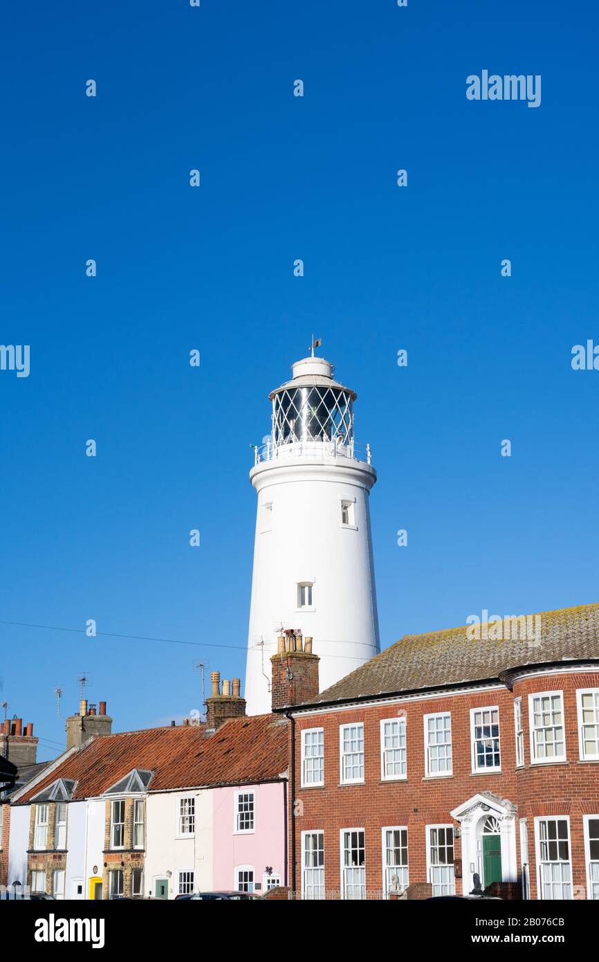 Old buildings with lighthouse in background. Southwold, Suffolk. UK Stock Photo