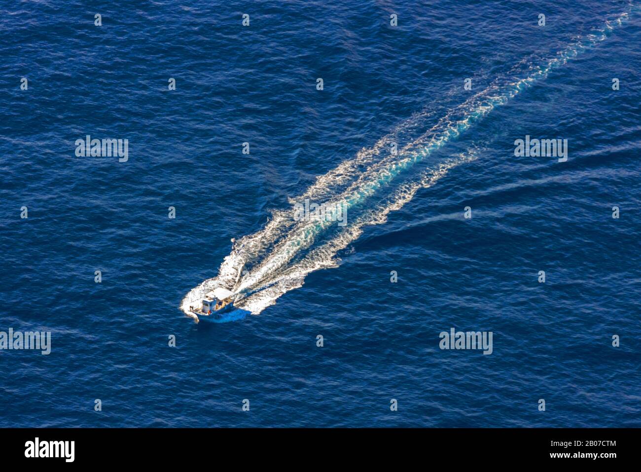 motorboat with trails on the Mediterranian Sea, 09.01.2020, aerial view, Spain, Balearic Islands, Majorca Stock Photo
