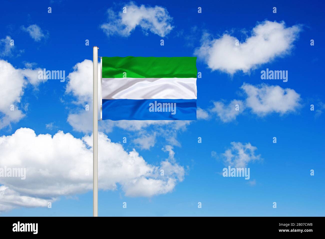 flag of Sierra Leone in front of blue cloudy sky, Sierra Leone Stock ...