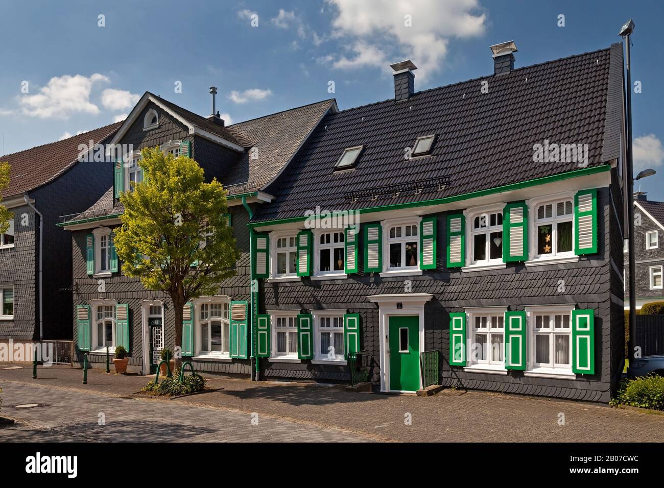 half-timbered houses, Bergischer Dreiklang with the colors black, white and green, Germany, North Rhine-Westphalia, Bergisches Land, Radevormwald Stock Photo