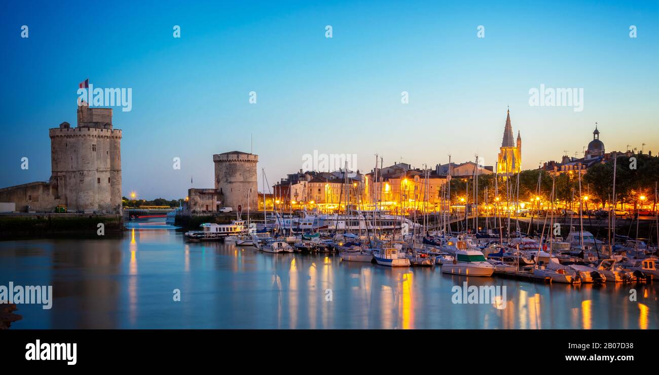 Old harbor of La Rochelle, France at night Stock Photo