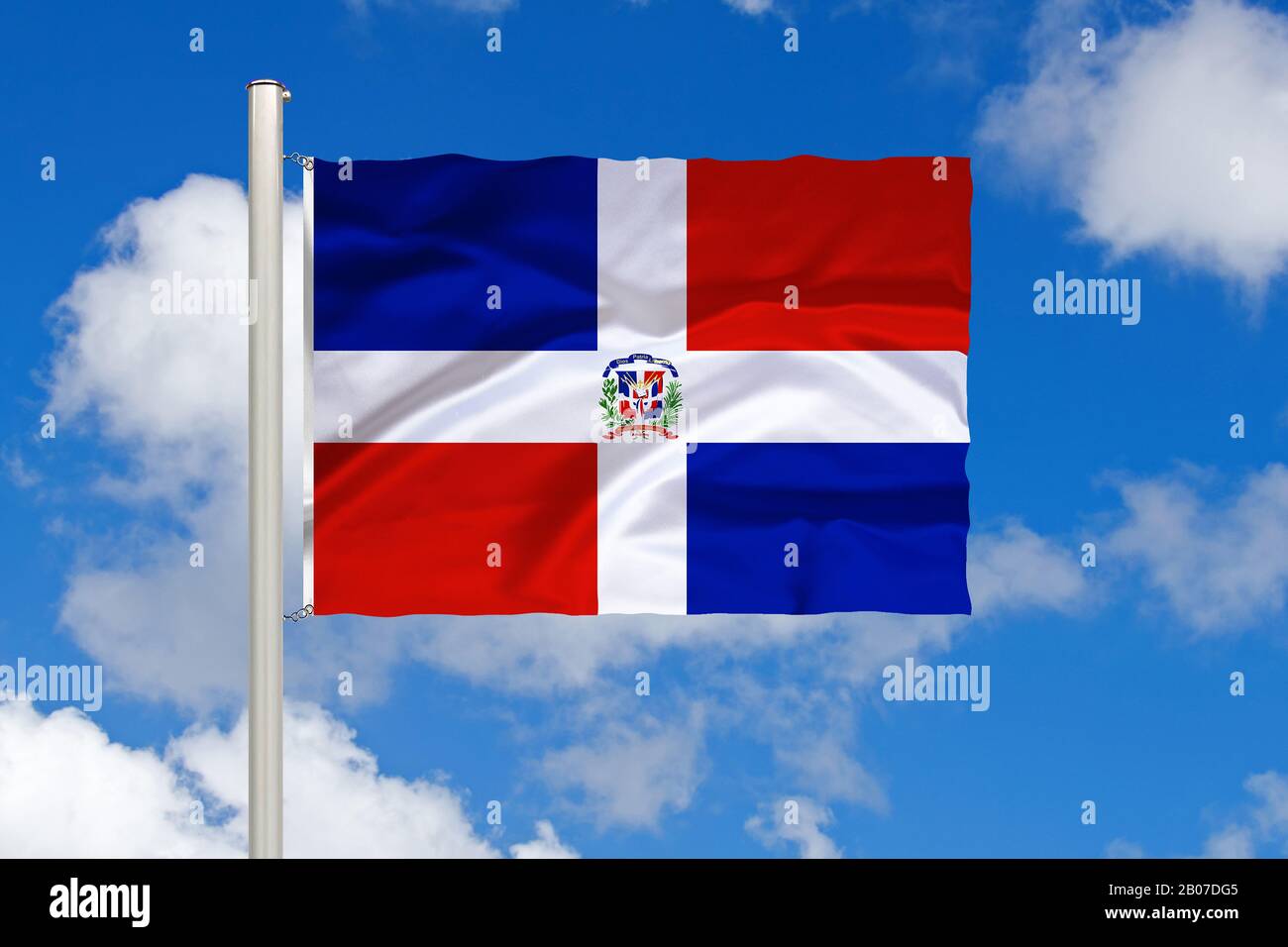 flag of Dominican Republic, Hispaniole in front of blue cloudy sky