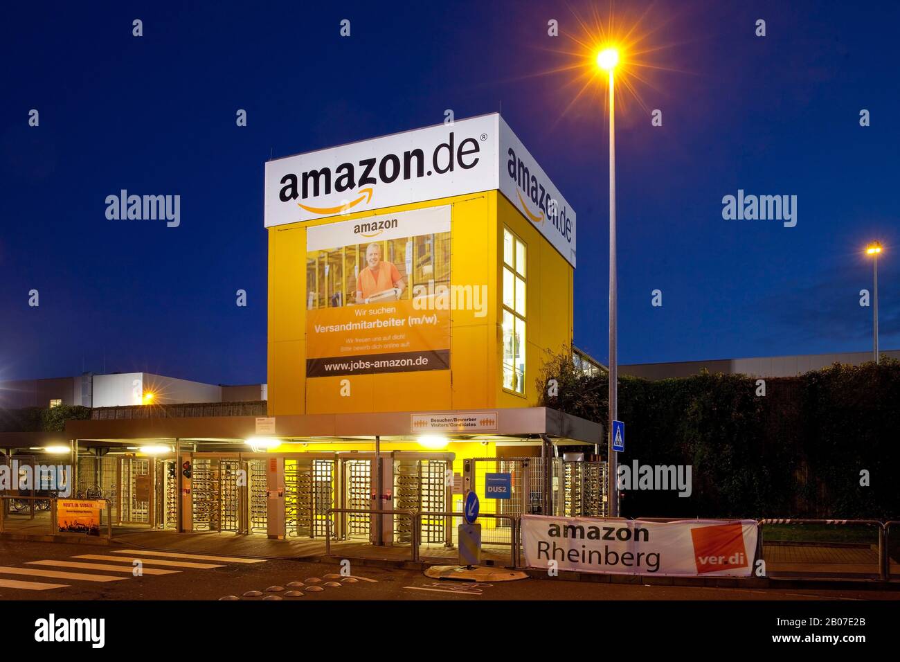 logistics centre of Amazon in the evening, one of the biggest Amazon sites in Europe, Germany, North Rhine-Westphalia, Ruhr Area, Rheinberg Stock Photo