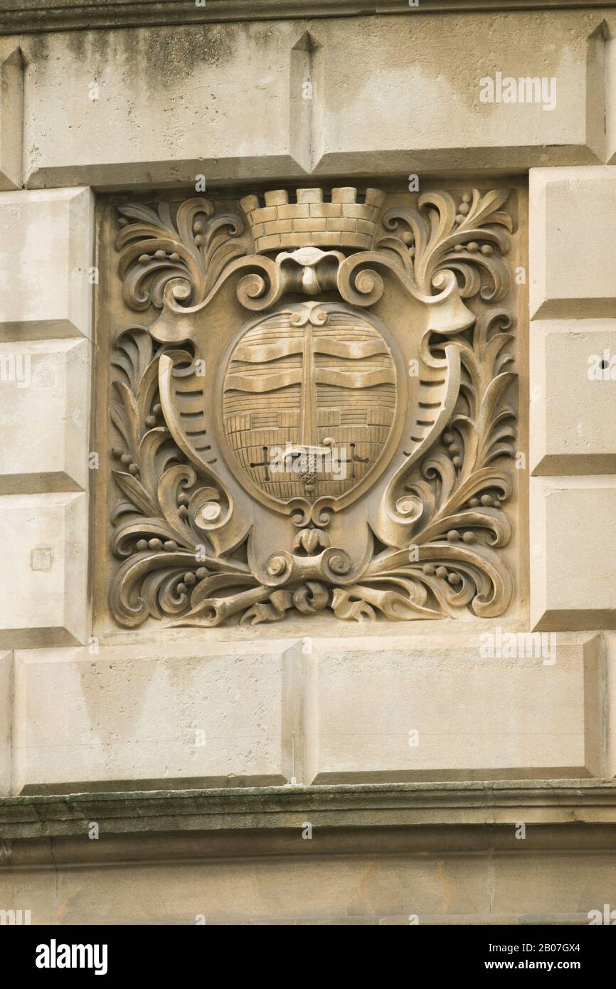 City of Bath coat of arms on a stone building in the City of Bath, Somerset, UK Stock Photo