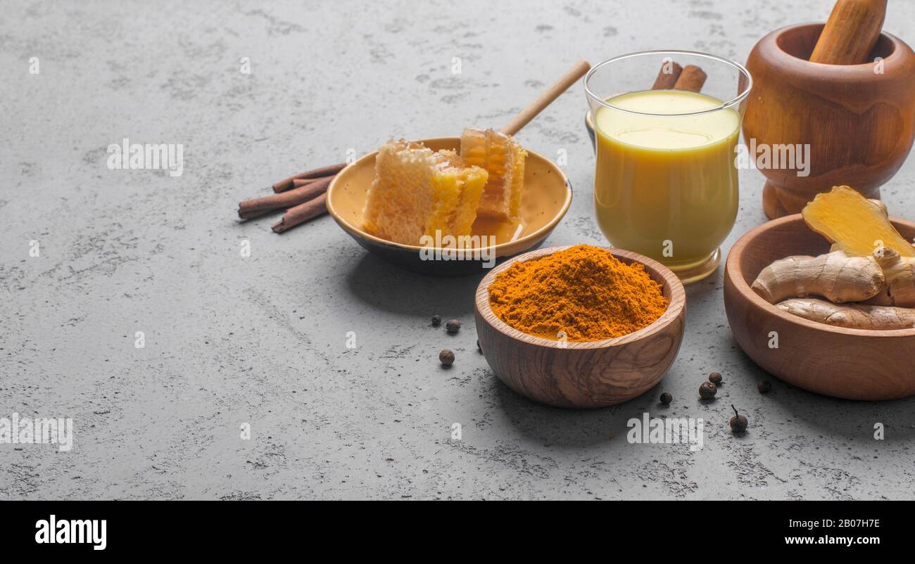 Ayurvedic drink golden almond milk or pumpkin turmeric latte Stock