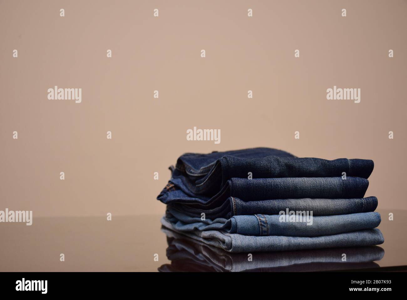 Set of Colorful shades of blue jeans trousers   isolated in style light jeans and dark jeans , Fashion trends of  denim jean pants, fashion concept Stock Photo
