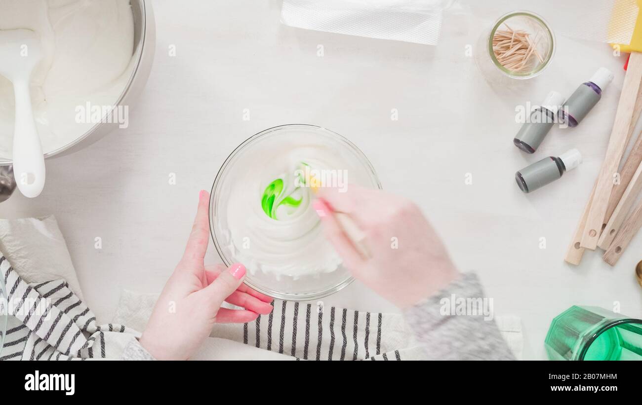 Step by step. Flat lay. Mixing royal icing to decorate Easter sugar