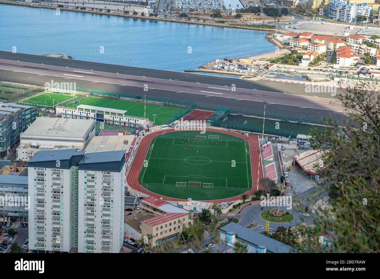 Gibraltar - January 12, 2020: football field next to the Gibraltar airport runway Stock Photo