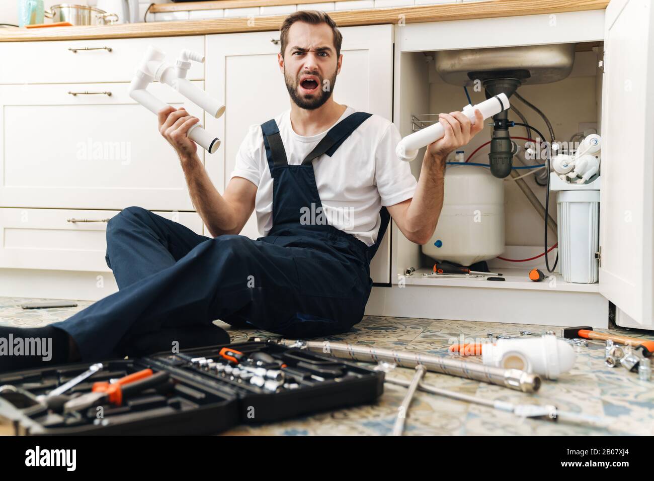 Angry plumber hi-res stock photography and images - Alamy