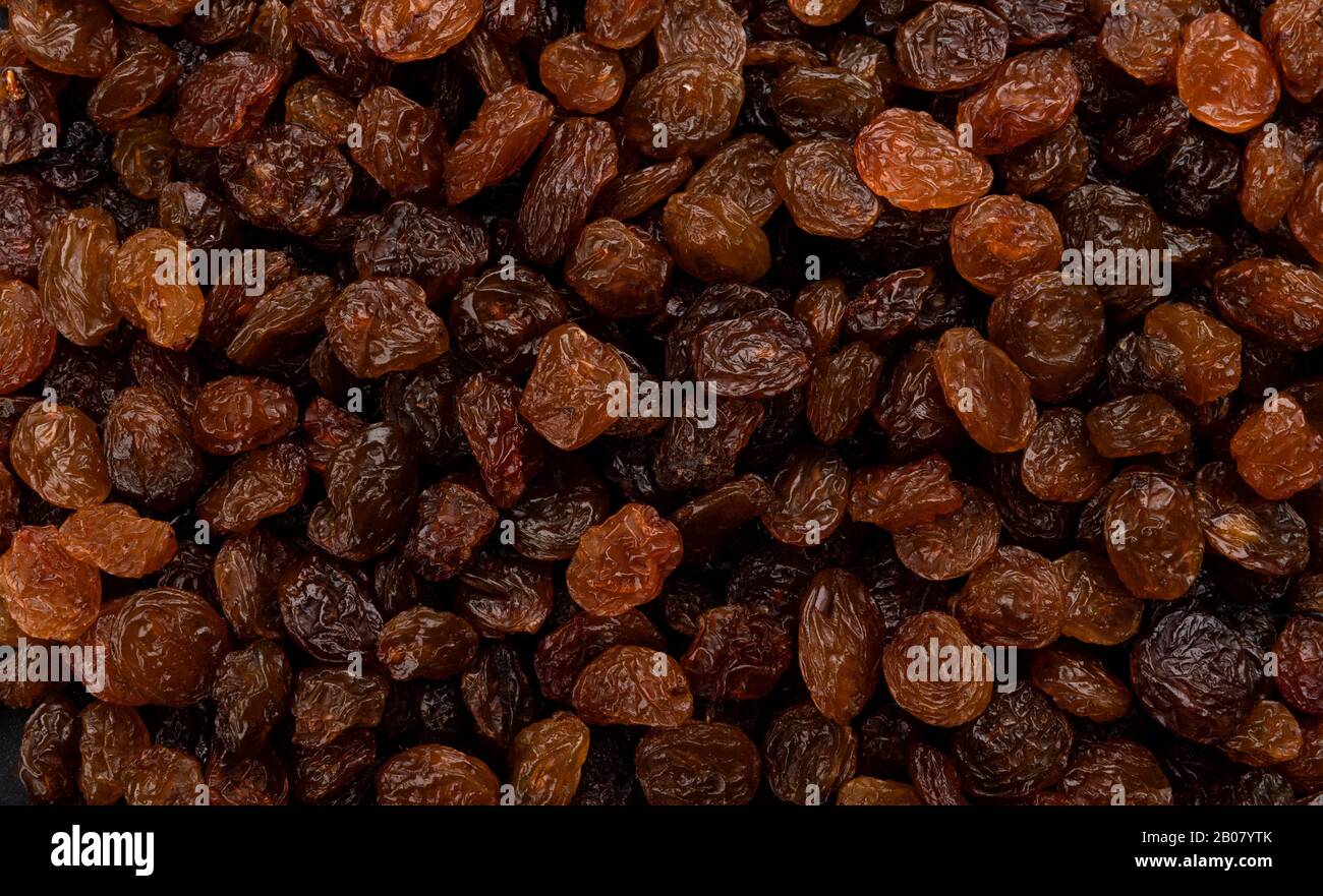 Raisins texture or background, top view close-up Stock Photo