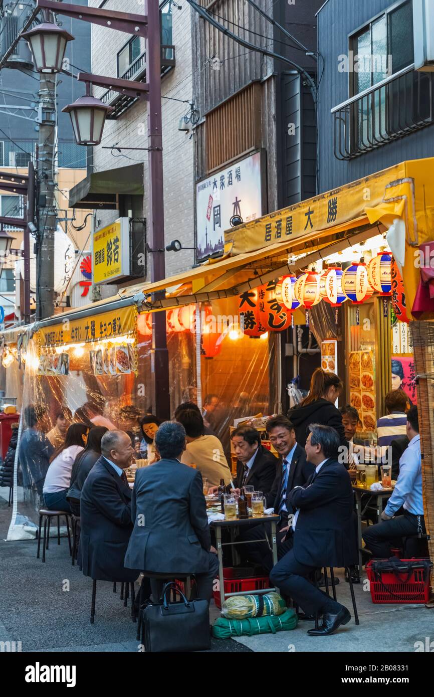 Japan, Honshu, Tokyo, Asakusa, Group of Japanese Businessmen Enjoying