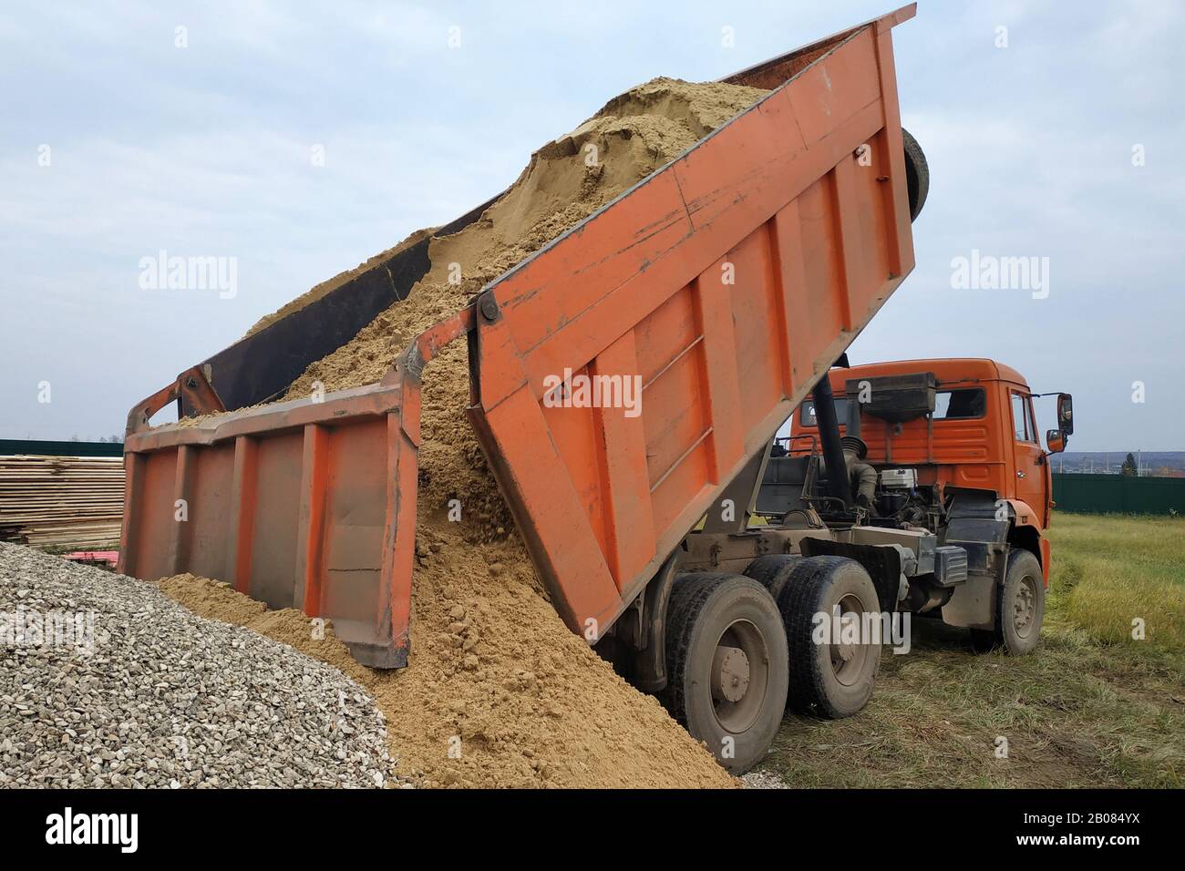 Dump Truck Unloading Sand High Resolution Stock Photography And Images Alamy