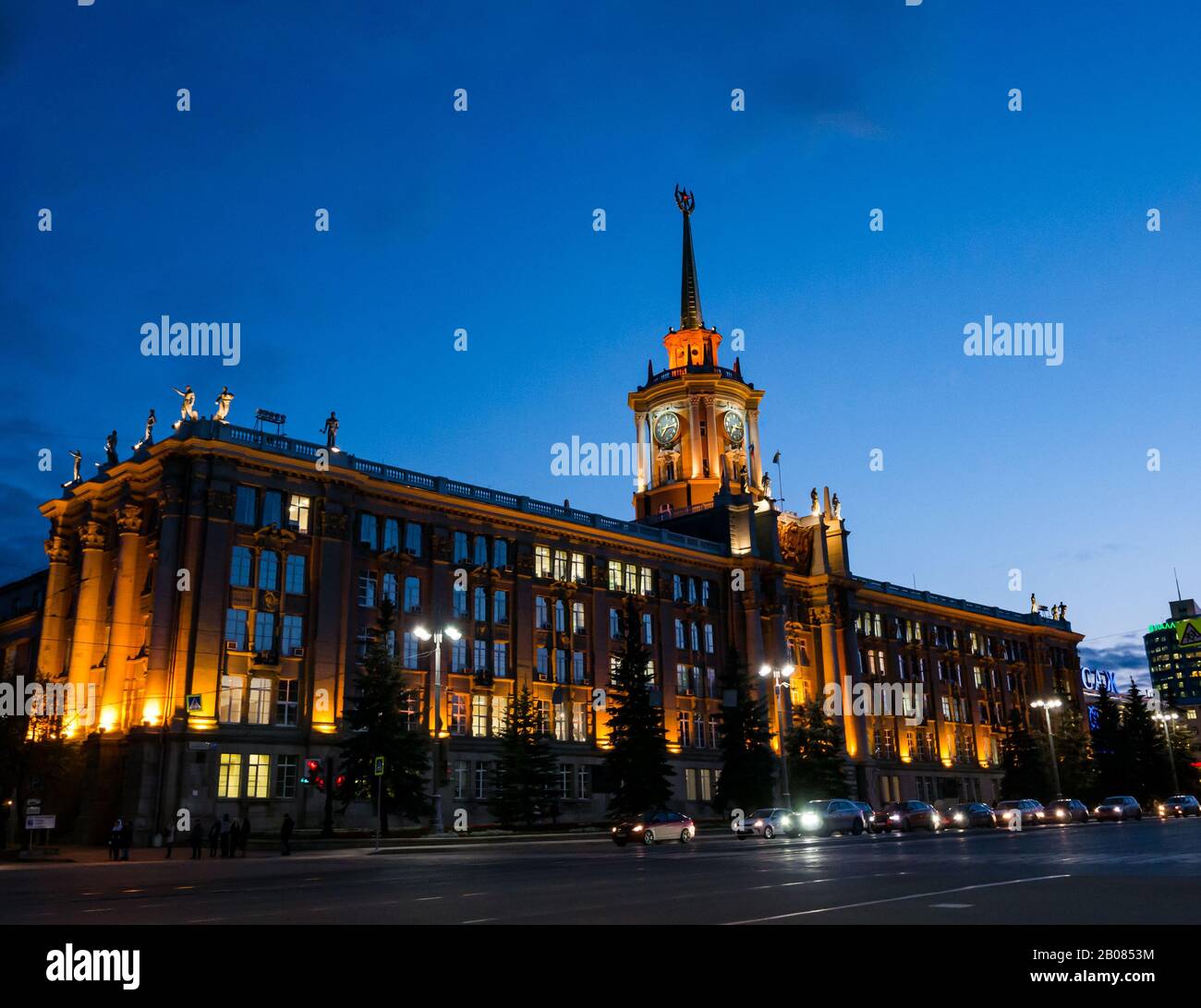 Grand ornate building lit up at night, Ekaterinburg City Hall, Lenin Avenue, Yekaterinburg, Siberia, Russian Federation Stock Photo