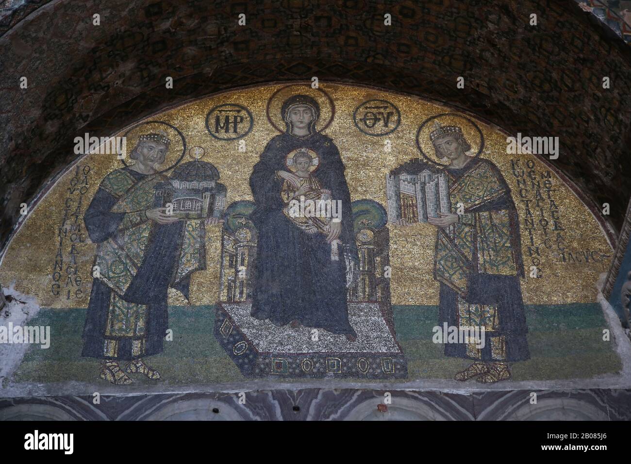 Turkey. Istanbul. Hagia Sofia. Byzatine mosaic. Virgin Mary with Jesus, emperors Constantine and Justinian. Tympanum. 994. Stock Photo