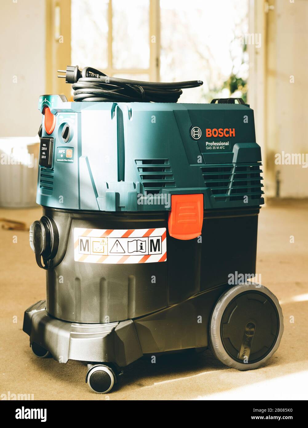 Strasbourg, France - Feb 9, 2020: Front view of Bosch Professional Gas 35 M  Class AFC with automatic filter cleaning system extractor on the  construction site concrete floor Stock Photo - Alamy