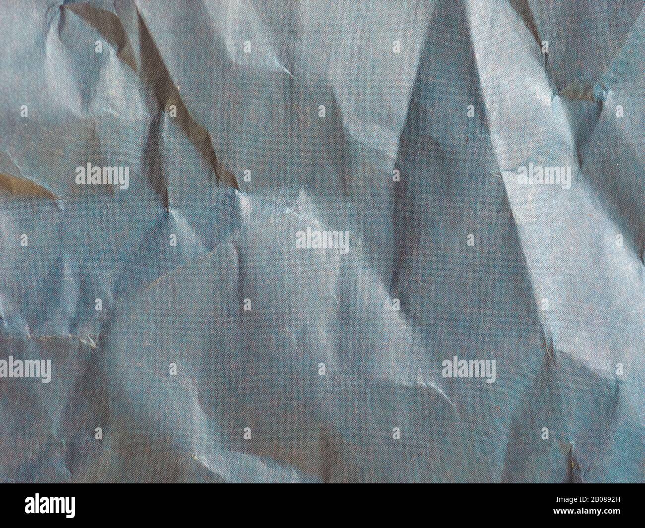 blue crinkled paper texture useful as a background Stock Photo