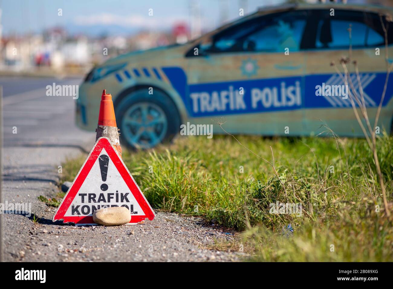 Turkish trafik kontrol sign in front of a fake police car. Trafik kontrol means traffic control. Stock Photo