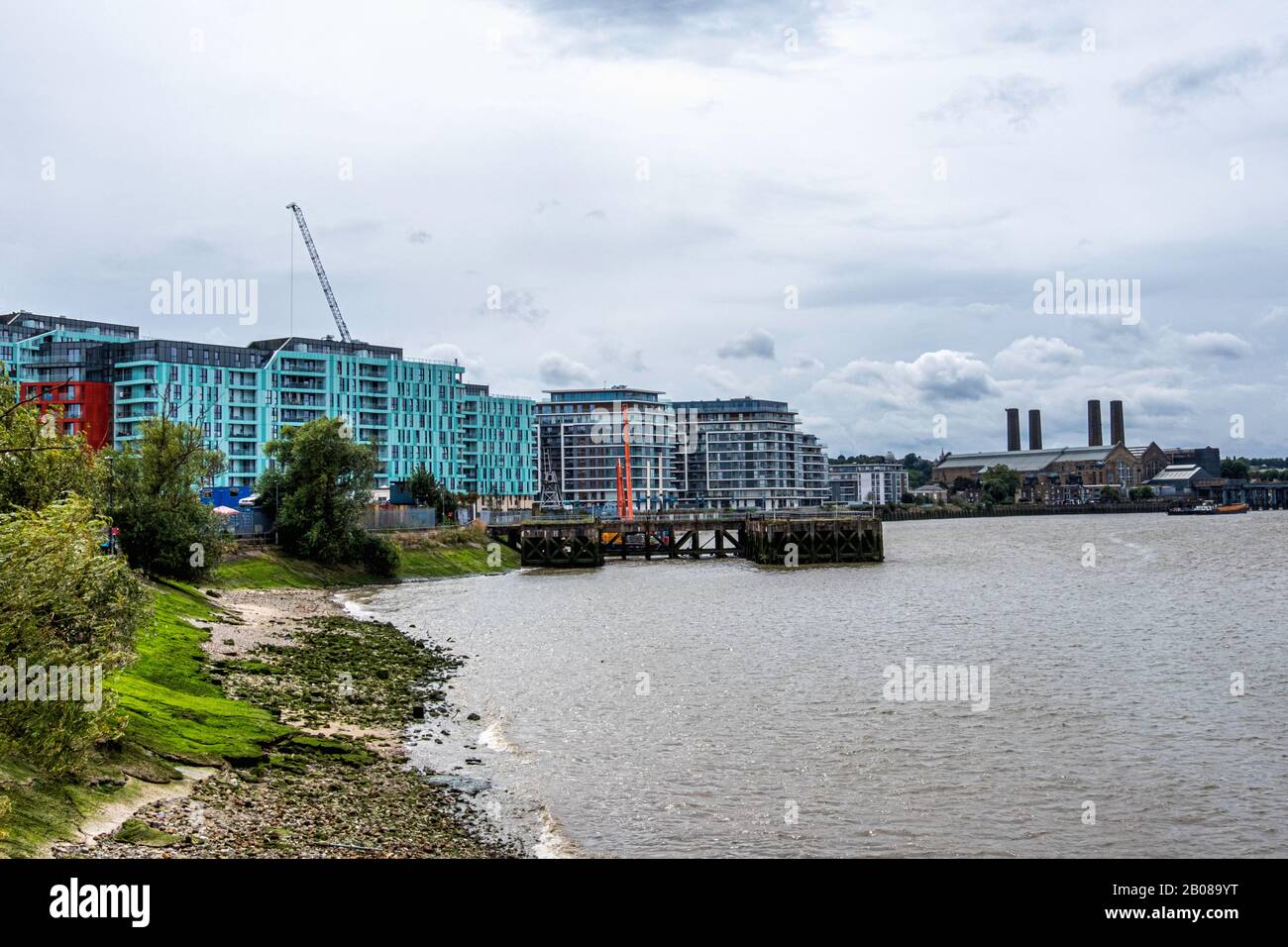 Thames river view of Enderby Wharf And River Gardens Walk newbuild