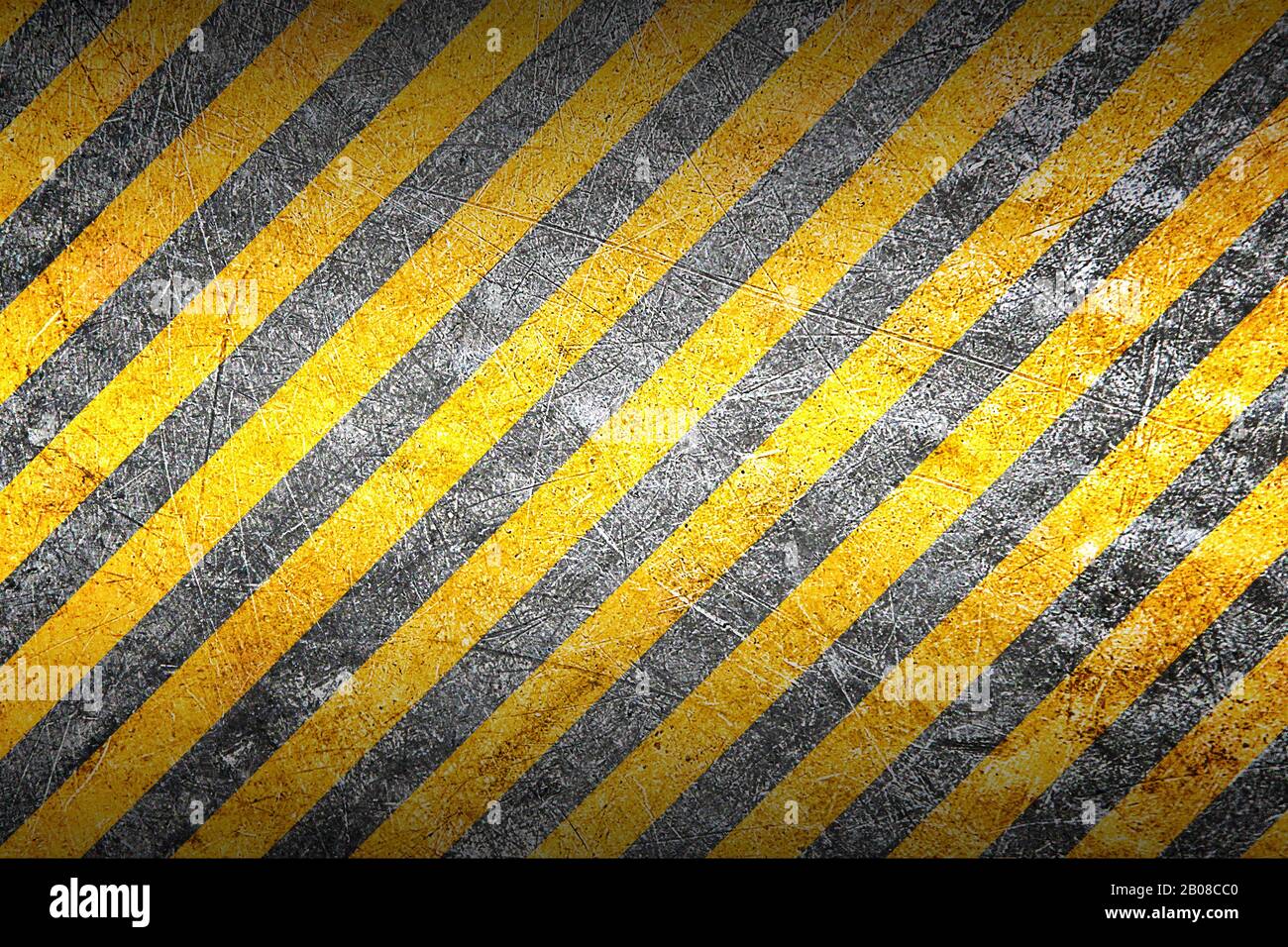 warning sign banner. yellow and black on metal plate. background and ...