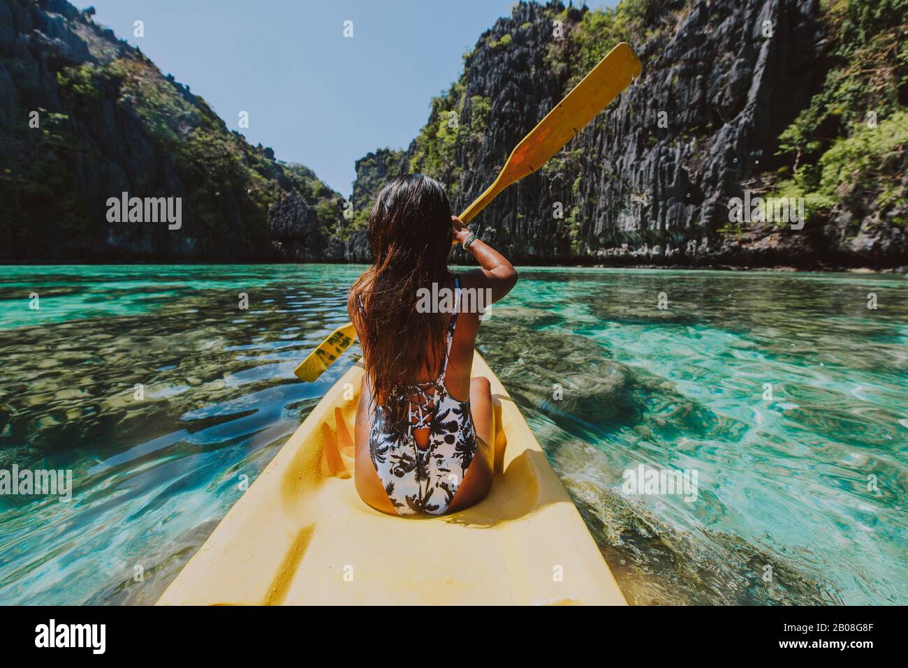 Beautiful woman enjoy the time at the lagoon in Coron, philippines. concept about tropical wanderlust traveling Stock Photo