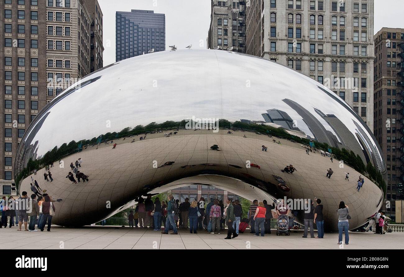 Cloud Gate  or The Bean sculpture by Indian born British artist Sir Anish Kapoor situated Millenium Park in the loop district of Chicago. . Stock Photo