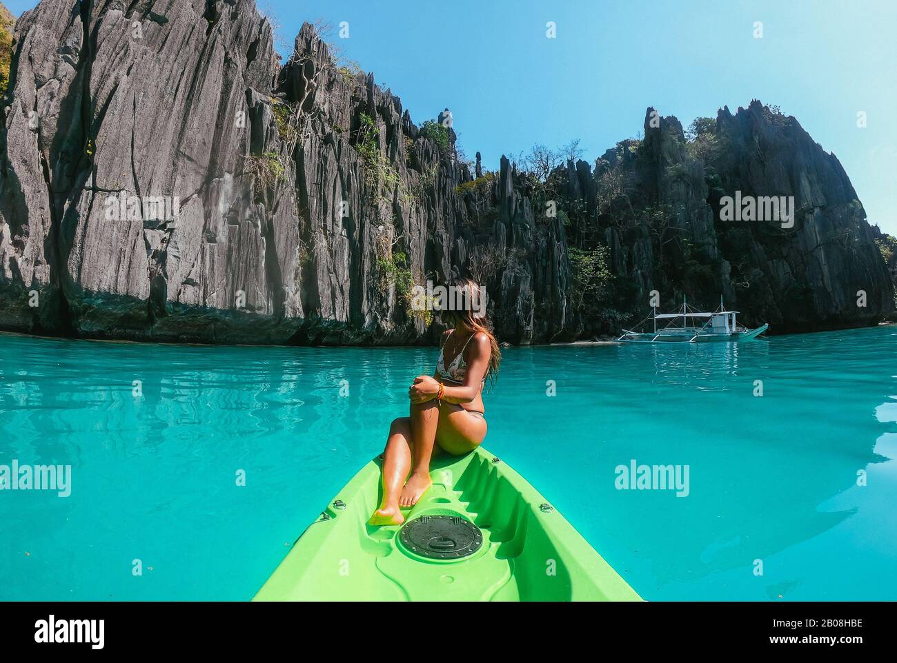 Beautiful woman enjoy the time at the lagoon in Coron, philippines. concept about tropical wanderlust traveling Stock Photo