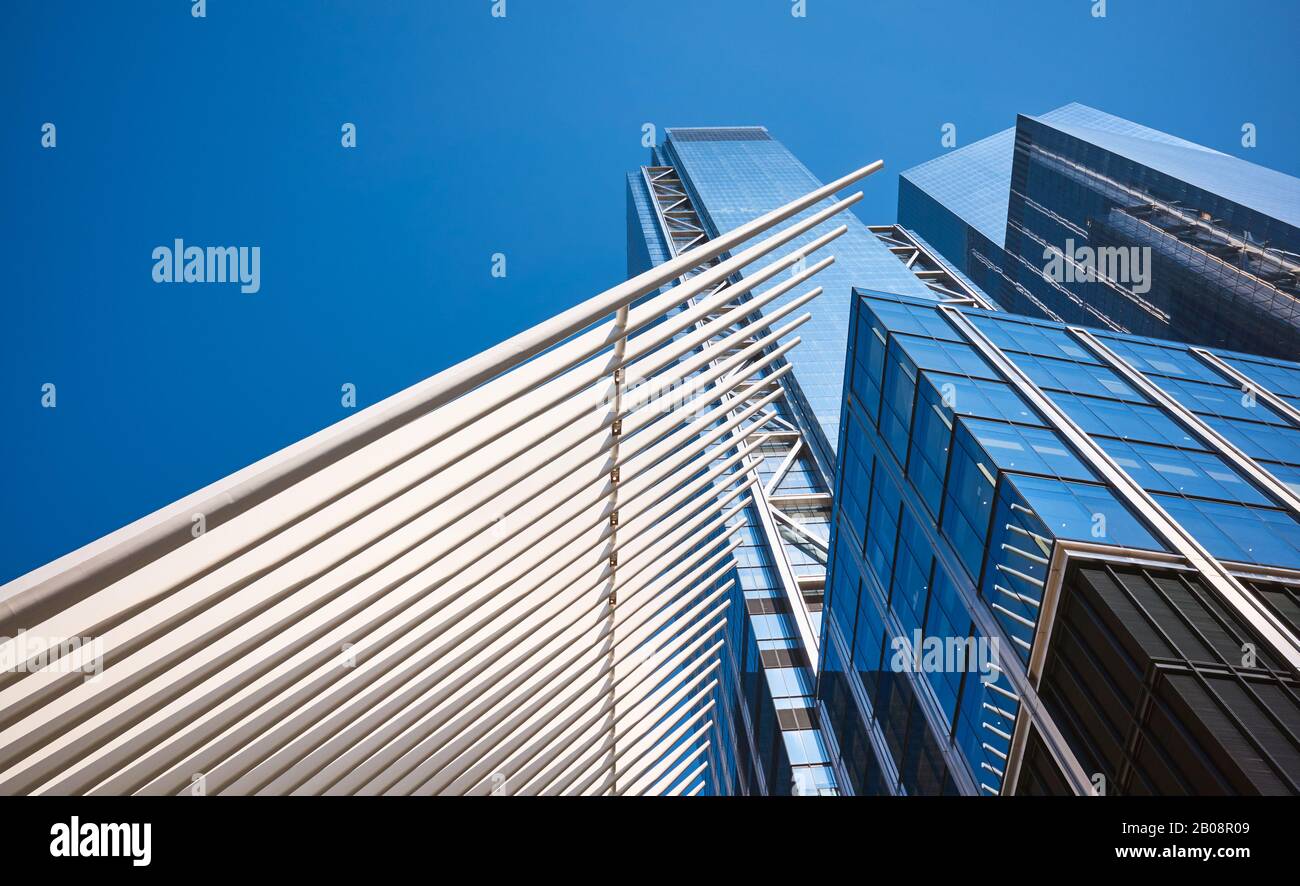 New York, USA - July 05, 2018: World Trade Center complex with Oculus ribs (WTC Transportation Hub) against the blue sky. Stock Photo