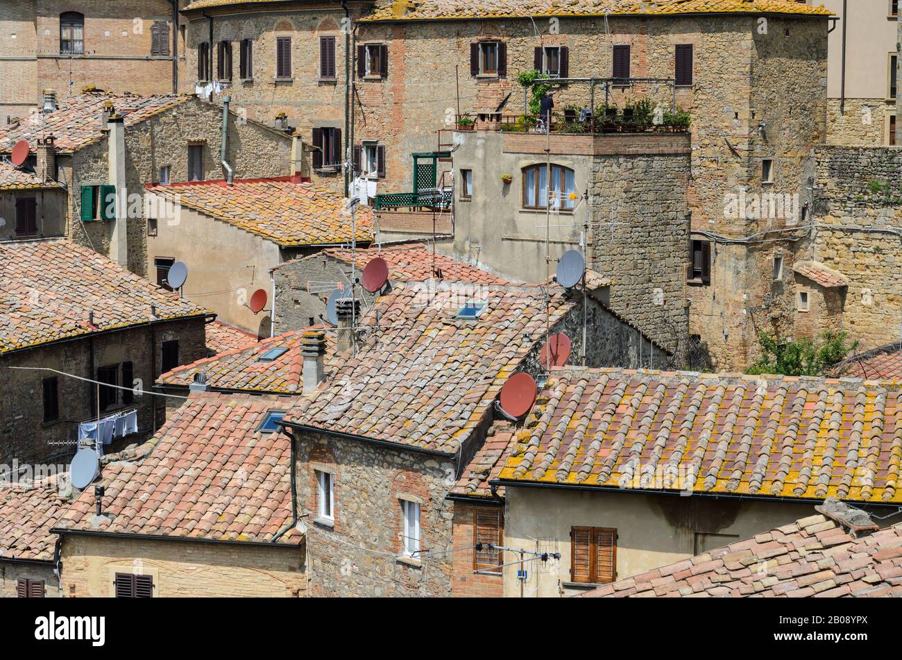 Densely packed houses and rooftops in Volterra in the Tuscany region of Italy, Europe. Stock Photo