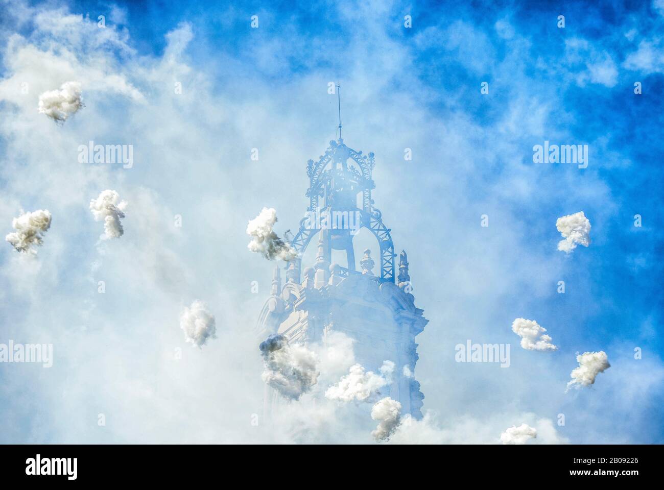 Mascleta firecrackers and the Town Hall of Valencia during the Fallas Festival in Spain. Stock Photo