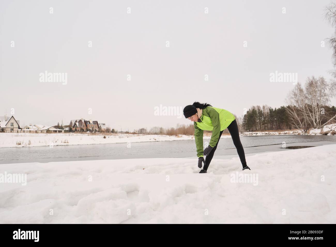 Young woman bending over outdoors hi-res stock photography and images ...
