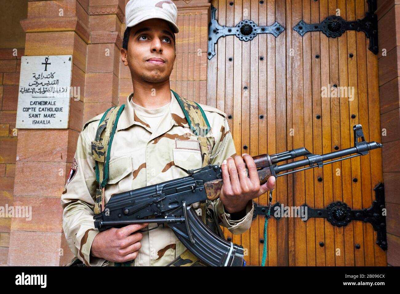 An armed soldier from the Egyptian Army guarding the Catholic cathedral