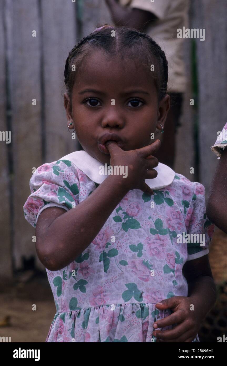 Portrait of little girl at the local farmers market in Mananjary in eastern Madagascar Stock Photo